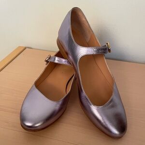 Silver w slight purple undertone leather Mary Janes, asymmetrical design, size 8